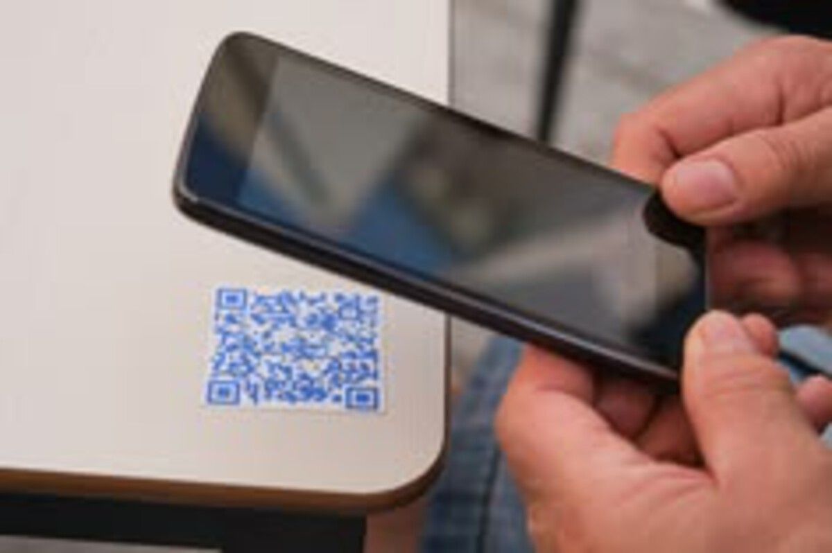 scanning-qr-asset-label-with-phone