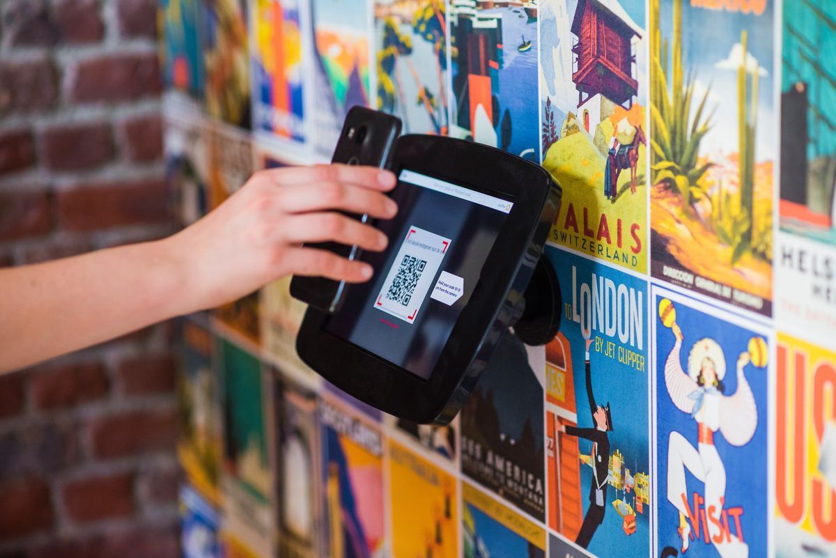 scanning-a-qr-code-to-visit-a-social-media-page